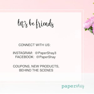 May include: A white card with the text "let's be friends" in black cursive writing. Below the text is a list of social media handles for Instagram and Facebook, followed by the text "COUPONS, NEW PRODUCTS, BEHIND THE SCENES". The card is on a pink background with a vase of pink flowers on the right side of the image. The text "papershay" is in teal blue at the bottom of the card.