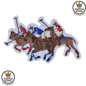 May include: Embroidered patch depicting three polo players on horseback. The players are dressed in red, blue, and white. The horses are brown with blue and red leg wraps. The patch includes the text "THE PATCH KING" and "RULE YOUR STYLE."