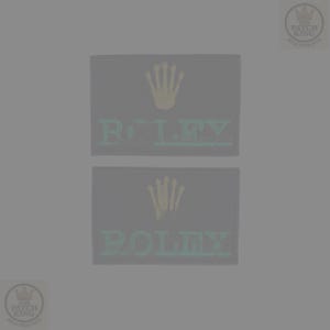 May include: Two rectangular black patches with the word "ROLEX" in green, and a gold crown emblem. The patches are embroidered with a textured pattern. The text and emblem are centered on the patches.
