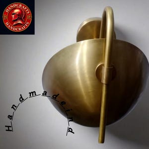 Brass Curved Disk Wall Sconce: Mid-Century Modern Light Fixture