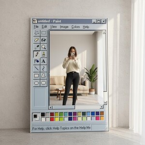 May include: A large, rectangular mirror designed to resemble a classic computer paint program window. The mirror frame is light blue with a selection of paint tools and color swatches. The reflection shows a person taking a photo.