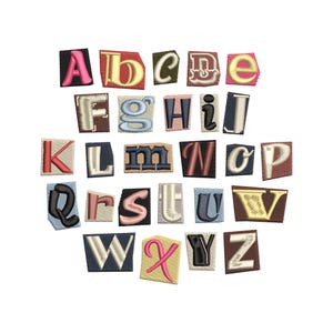 May include: Embroidered alphabet letters A through Z, each on a small, rectangular patch. The letters are in various colors, including pink, yellow, blue, and black, with a textured, stitched appearance. The patches have a frayed edge.