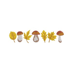 May include: Embroidered design featuring autumn elements. The design includes yellow leaves and brown and white mushrooms. The leaves and mushrooms are arranged in a row against a white background. The embroidery has a textured appearance.