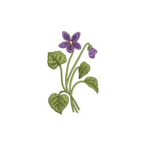 May include: An embroidered design of a violet flower with a yellow center and purple petals. The flower is surrounded by green leaves and stems, all on a white background. The design is detailed with textured stitching.