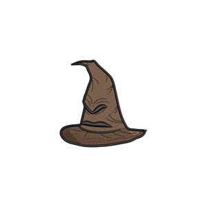 May include: A brown, pointed wizard's hat with a wide brim and embroidered details. The hat features a stylized face with black stitching for the eyes and mouth. The hat is a classic design.