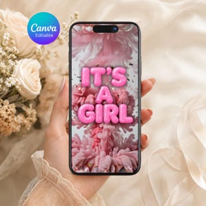 Puede incluir: Un teléfono inteligente que muestra un gráfico digital con el texto IT'S A GIRL en letras rosas estilo globo. El fondo presenta nubes de humo o tinta rosa arremolinadas. Una insignia circular azul de Canva Editable es visible arriba a la izquierda.