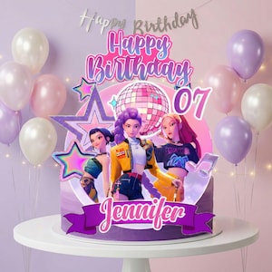 May include: A birthday cake with a purple base and a decorative topper featuring three animated figures. The cake is adorned with a banner that reads "Happy Birthday" and the name "Jennifer". Balloons in shades of pink, white, and purple surround the cake.
