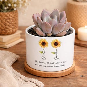 May include: A set of three ceramic mugs with a speckled, matte finish. The mugs are in shades of cream, light gray, and dark gray. Each mug has a simple, minimalist design, perfect for coffee or tea.
