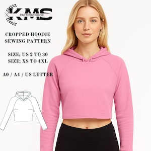 Pode incluir: Um moletom rosa curto com capuz e mangas compridas. A imagem inclui o texto "CROPPED HOODIE SEWING PATTERN" e informações de tamanho em tamanhos dos EUA. Um desenho a traço do moletom com capuz também é mostrado.
