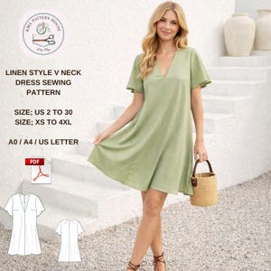 Puede incluir: Un vestido verde claro de lino con cuello en V y mangas cortas. La imagen incluye un patrón de costura con el texto "LINEN STYLE V NECK DRESS SEWING PATTERN" e información de tallas.