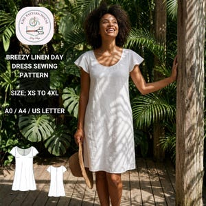 Peut inclure: Une femme porte une robe en lin blanc avec un col rond et des manches courtes. L'image comprend un patron de couture avec le texte "Breezy Linen Day Dress Sewing Pattern" et la taille "XS à 4XL". La robe arrive au genou.