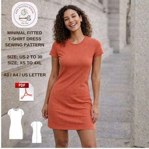 May include: A woman wearing a short-sleeved, rust-colored T-shirt dress. The image includes text: "MINIMAL FITTED T-SHIRT DRESS SEWING PATTERN" and size information. A PDF icon is also visible.