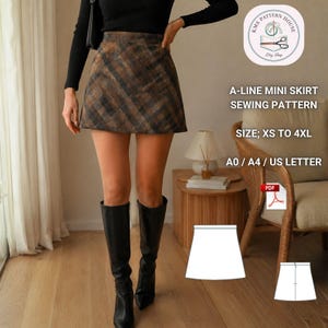 Peut inclure: Une mini-jupe trapèze à carreaux marron et noir. L'image contient le texte : A-LINE MINI SKIRT SEWING PATTERN, SIZE: XS TO 4XL, A0 / A4 / US LETTER. Une icône PDF et un dessin au trait blanc du patron de la jupe sont également visibles.
