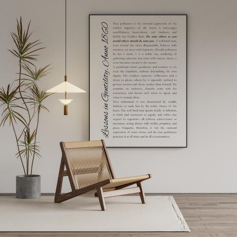 May include: A minimalist interior scene featuring a wooden chair with woven seat, a potted plant, and a pendant light. A framed print with text is on the wall. The overall aesthetic is modern and serene.