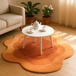 Hand-Tufted Wool Rug: Earthy Orange Amoeba Shape, Abstract Design