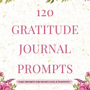 Peut inclure: Un journal de gratitude avec le texte "120 GRATITUDE JOURNAL PROMPTS" en rose. Le journal est orné d'éléments floraux à l'aquarelle dans des tons roses et violets, avec les mots "DAILY PROMPTS FOR MINDFULNESS & POSITIVITY".