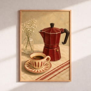 Può includere: Una stampa artistica incorniciata raffigurante una moka rosso scuro, una tazzina da caffè in ceramica color crema con strisce verticali rosse su piattino abbinato e un vaso in vetro trasparente contenente piccoli fiori bianchi su base beige.