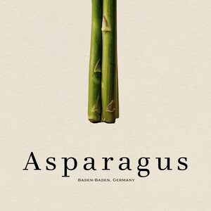 May include: Close-up of fresh green asparagus stalks against a cream-colored background. The word "Asparagus" is printed in a serif font below the stalks, with "BADEN-BADEN, GERMANY" underneath.