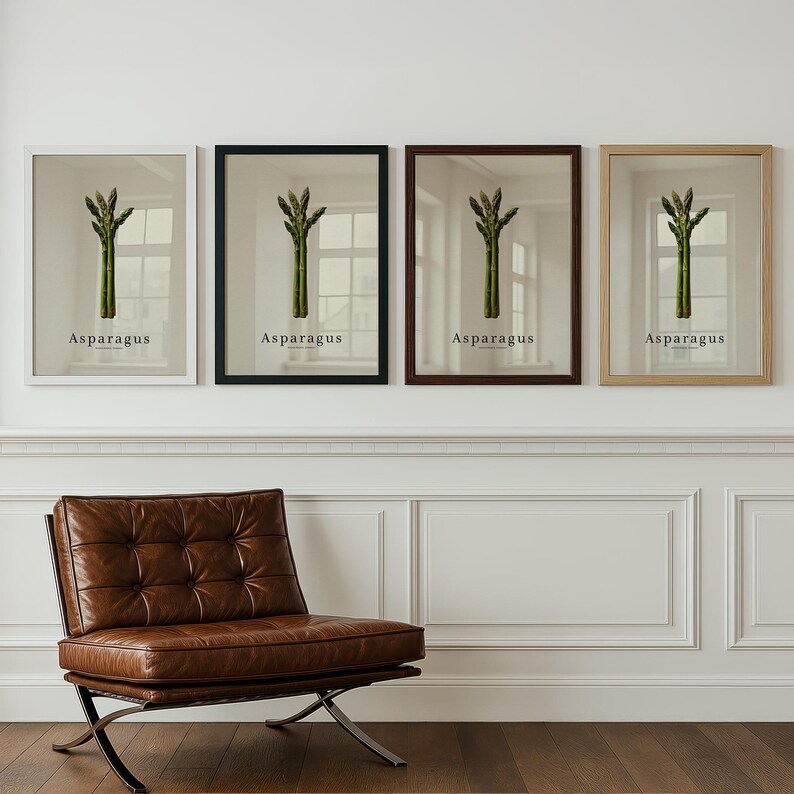 May include: Four framed art prints featuring asparagus illustrations. Each print has a different frame color: white, black, brown, and natural wood. The word "Asparagus" is printed in a simple font below the image of the vegetable.
