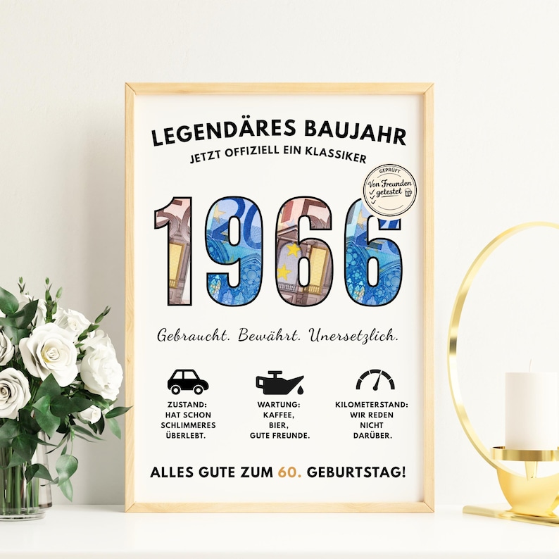 May include: A framed print with the year "1966" in large numbers, filled with a money-like design. The print includes German text, icons, and the phrase "Alles Gute zum 60. Geburtstag!" in black font. The frame is light brown.