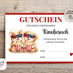 Puede incluir: Un vale de regalo blanco con detalles en rojo presenta dos perros de dibujos animados con gafas 3D y palomitas de maíz. El texto dice "GUTSCHEIN" y "Kinobesuch". Incluye espacio para escribir "FÜR" y "VON".
