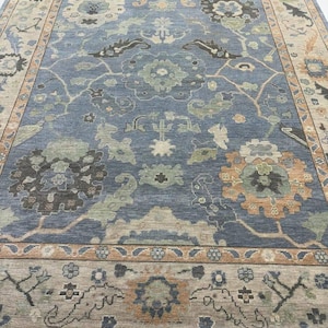 Hand-Knotted Blue Oushak Wool Rug: Earth Tone Florals, Vintage Style