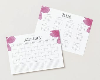 May include: Two white 2026 calendars with a floral design. The January calendar has a to-do list and goals section. The calendars have a pink watercolour floral design in the corners.