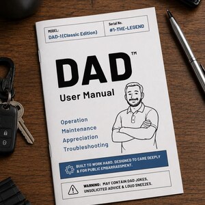 May include: A white booklet titled DAD User Manual with a black and white line drawing of a man with arms crossed. The cover features text including Model DAD-1 Classic Edition, Serial No. 1-THE-LEGEND, and a warning about dad jokes and loud sneezes.