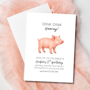 May include: A white invitation card with a watercolor illustration of a smiling pink pig. The text reads "OINK OINK Hooray!" and "Join us to celebrate Hudson's 5th Birthday" with event details. A white envelope is behind the card.