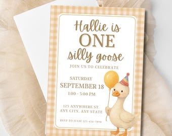 May include: A birthday invitation with a whimsical design. The invitation features the text "Hallie is ONE silly goose" with a watercolor illustration of a goose holding a balloon. The date and time of the party are also included.