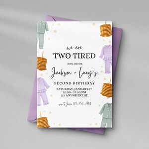 May include: A birthday invitation with the text "we are TWO TIRED" and details for Jackson + Lucy's second birthday. The invitation features illustrations of pancakes, pajamas, and stars. The invitation is on a white background with a purple envelope.