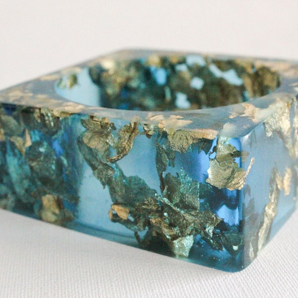 cubic azure eco resin bangle with suspended gold leaf