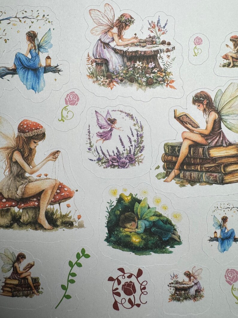 May include: A collection of fairy-themed stickers featuring various illustrations of fairies in different settings. The stickers showcase fairies with wings, dressed in flowing gowns, engaged in activities like reading, crafting, and resting amidst nature. The color palette includes soft blues, purples, and greens.