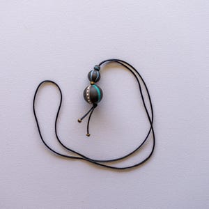 Roundy, boho necklace with hand painted wooden beads and bronze details, eco friendly wooden jewellery