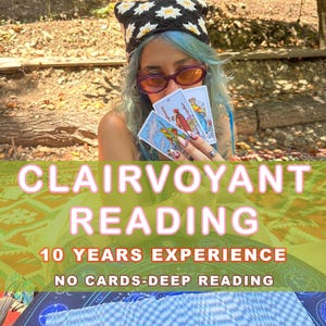 May include: An image featuring the text "Clairvoyant Reading" in pink letters. The text is overlaid on a person holding tarot cards. The person is wearing a black hat with white daisy designs and orange-tinted glasses. The text also includes "10 Years Experience" and "No Cards-Deep Reading."