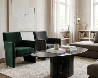 Tavolino ovale in marmo nero Marquina con base a piedistallo scanalata, mobile moderno per soggiorno.