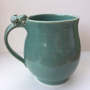 Laura Burch mug with frog