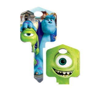 May include: Two decorative key blanks featuring characters from the animated film "Monsters, Inc.". One key shows Mike Wazowski and James P. Sullivan, and the other key features Mike Wazowski. The keys are green, blue, and white.
