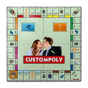 May include: Custom Monopoly board with a central image of a kissing couple. The board game has green and white squares with property names and Chance and Treasure Chest spaces. The word "CUSTOMPOLY" is displayed.