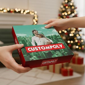 May include: A red and green box with the word "CUSTOMPOLY" in white and red. The box features a photo of a couple embracing in front of a city skyline. The box is being held by two hands, with a Christmas tree in the background.