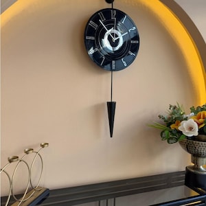 Relógio de parede LED com pêndulo moderno, decoração de luxo para casa, relógio minimalista para sala de estar.
