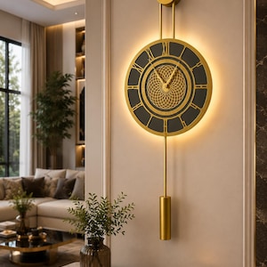 May include: A circular wall clock with a gold frame and a black face featuring gold Roman numerals. The center has a gold geometric lattice pattern, and the clock is illuminated by a soft backlight. A gold pendulum hangs from the bottom.