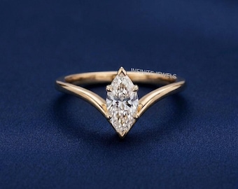 Marquise Cut Moissanite Engagement Ring: 14k Yellow Gold V Band