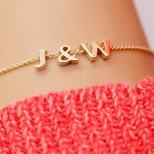 Gold bracelet with letter charms hotsell