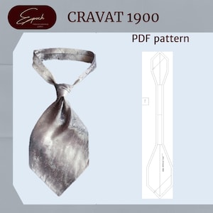 Puede incluir: Una corbata plateada con un diseño floral, anudada al cuello. La imagen incluye el texto "CRAVAT 1900" y "PDF pattern". También se muestra un diagrama del patrón de la corbata.
