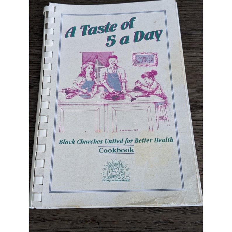 May include: A spiral-bound cookbook titled "A Taste of 5 a Day." The cover features an illustration of a family preparing food. The text "Black Churches United for Better Health Cookbook" is also visible.