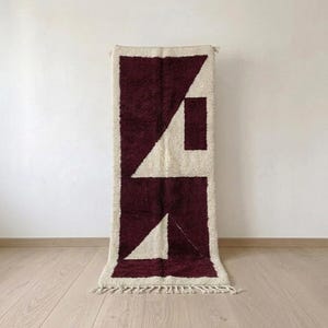 Moroccan runner rug in burgundy wool, hand-knotted ivory border hallway runner with abstract angular pattern
