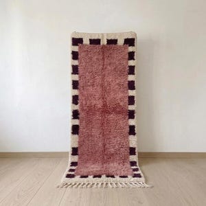 Handwoven Berber wool runner in dusty rose, Moroccan hallway rug with plum checker frame