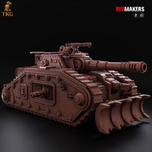 May include: A brown model tank with a large cannon, tracks, and a front blade. The tank has intricate details, including rivets and hatches. The text "REDMAKERS" is visible in the top right corner.