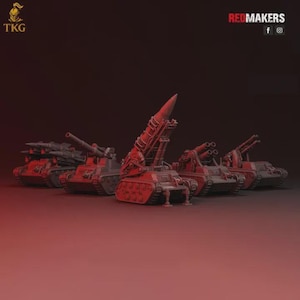 May include: A collection of red and gray miniature military vehicles, including tanks and missile launchers, are displayed against a dark red background. The vehicles are detailed with various weapons and treads. The text "REDMAKERS" is visible in the top right corner.